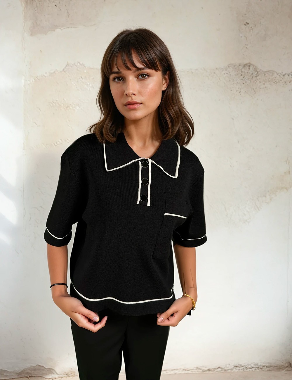 Black polo shirt with white trim