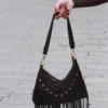 Vue mouvement franges sac suède marron