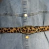 Détail imprimé léopard sur cuir authentique
